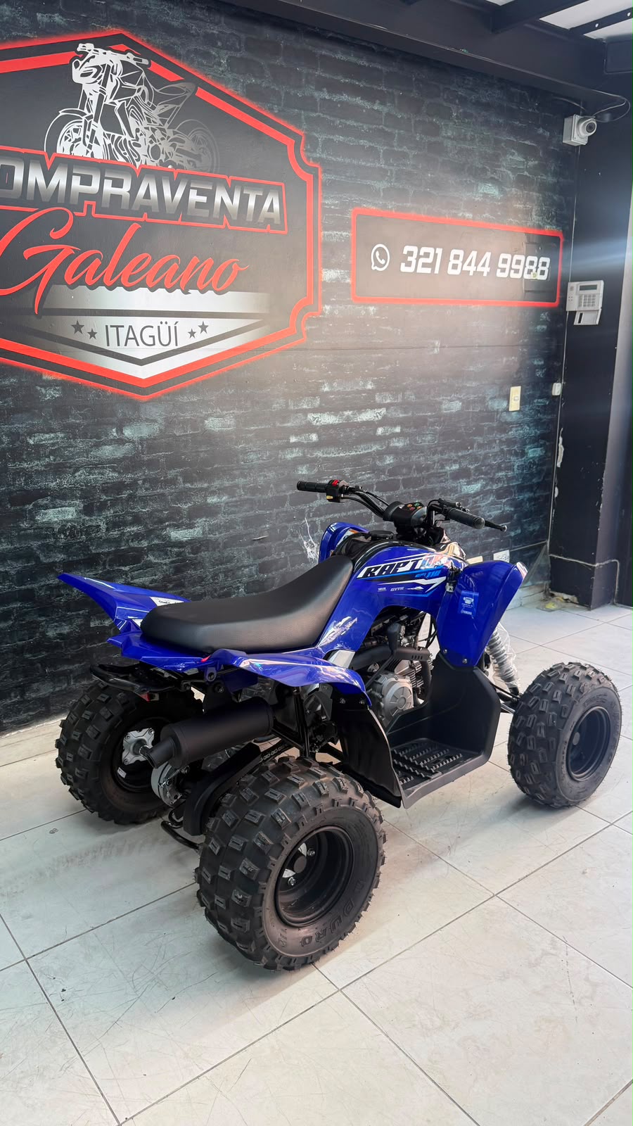 Yamaha Raptor 110 modelo 2026 · Vista trasera y lateral